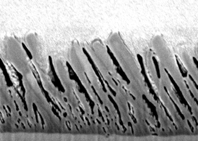 Improved film density for coatings at grazing angle of incidence in high power impulse magnetron sputtering with positive pulse